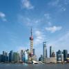 Shanghai skyline by day seen from the sea.